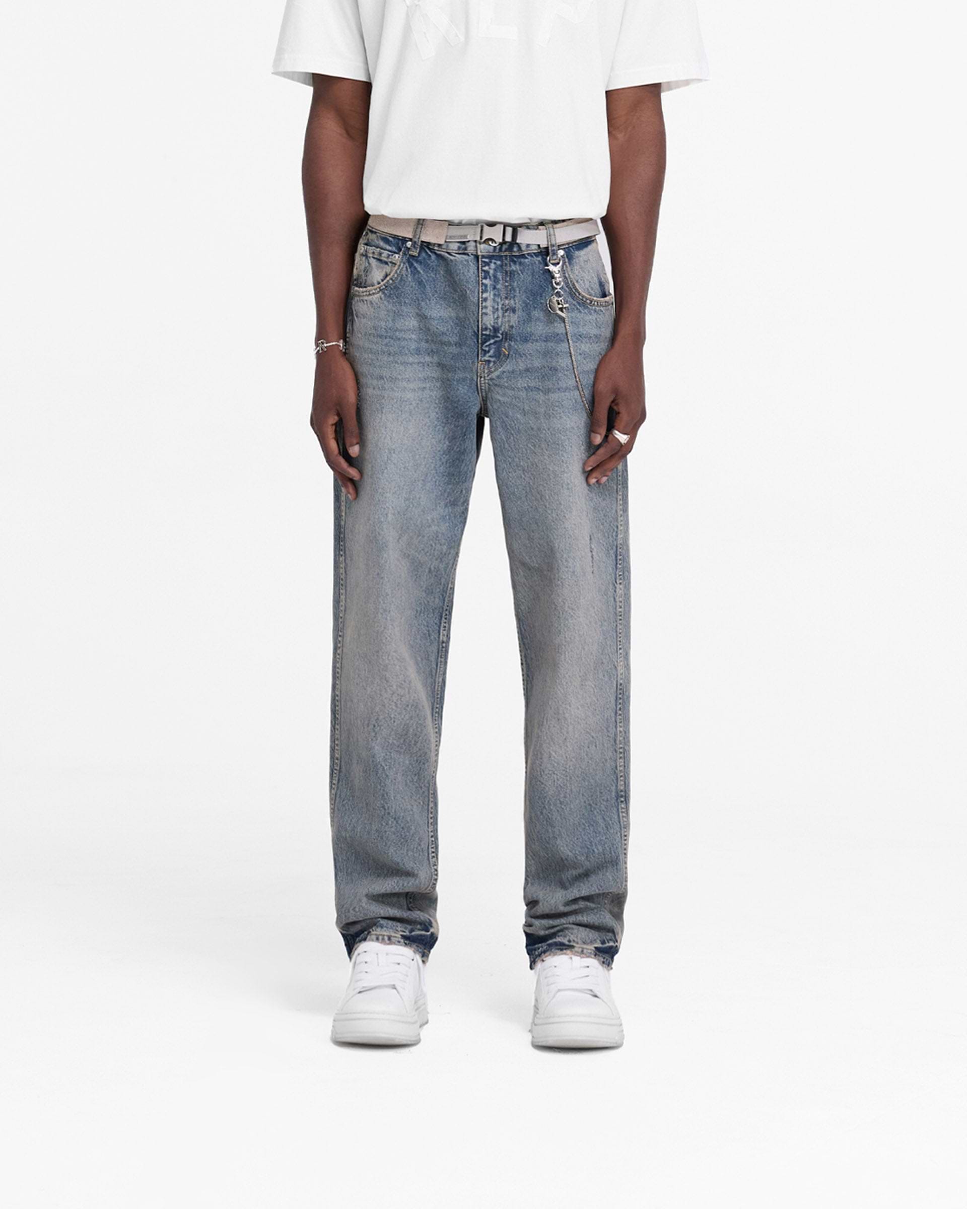 Back product image of mens blue denim jeans on a plain white background | R2 Straight Leg Denim in Mid Blue | Straight leg jeans with embroidered initial and metal hardware | FW24 Denim | Represent Clo