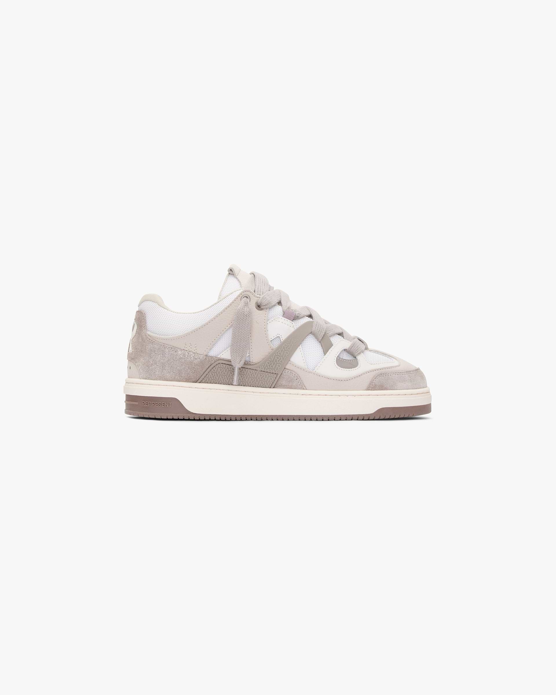 Front product image of a mens taupe sneaker on a plain white background | Bully Sneaker in Washed Taupe Cashmere | High-end mens sneakers | SS24 Footwear | Represent Clo