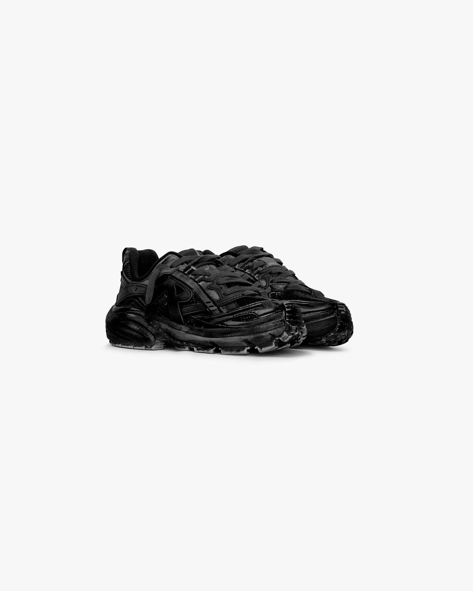 Back product image of a mens black dip dye shoe on a plain white background | Storm Runner Dip Dye in Off Black | Mesh upper footwear with TPU overlays | SS25 Footwear | Represent Clo