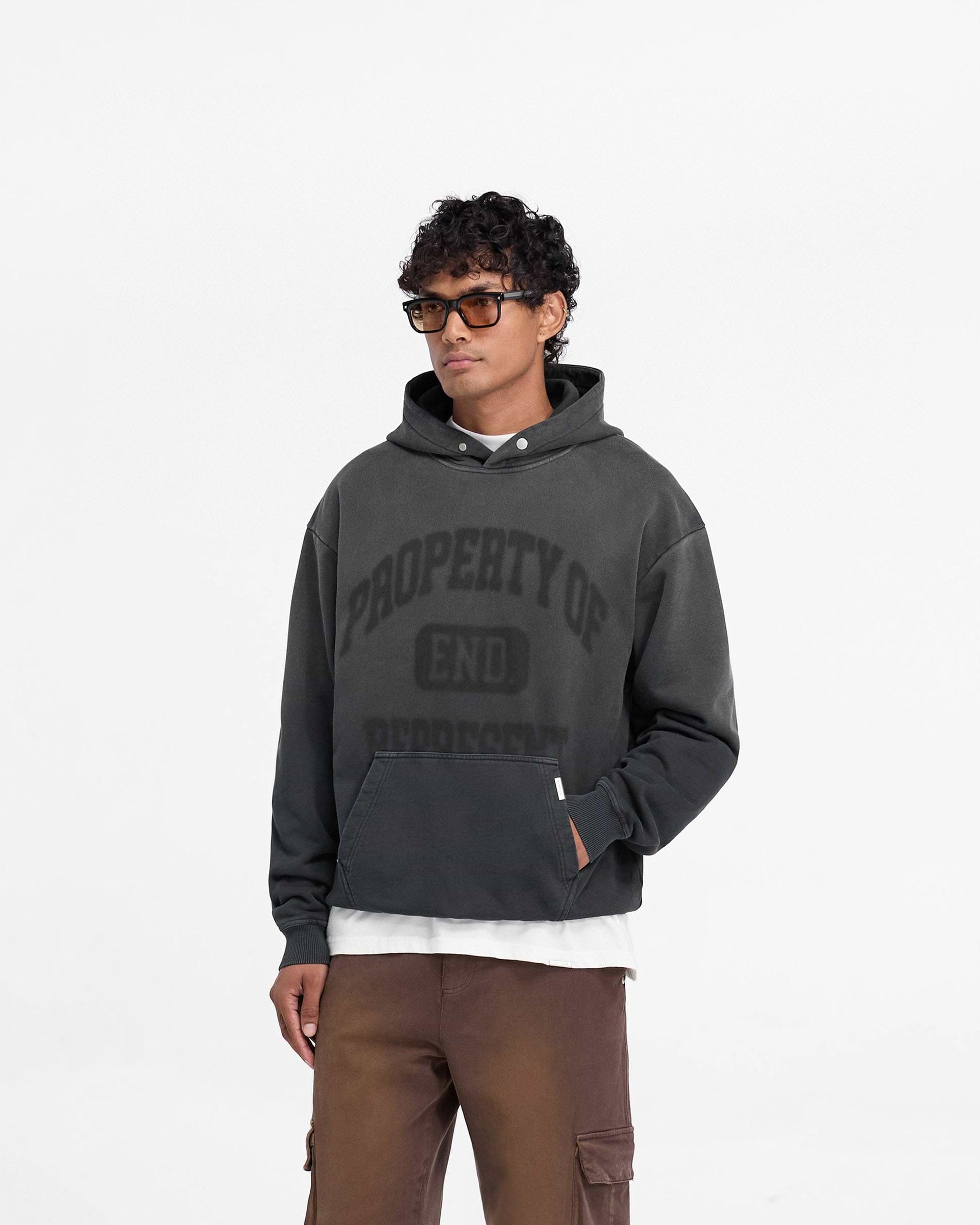 Back product image of a mens black hoodie on a plain white background | Represent X End Property Of Hoodie in Stained Black | Oversized hoodie with ghost graphic print and ribbed hem | Exclusives Hoodies | Represent Clo