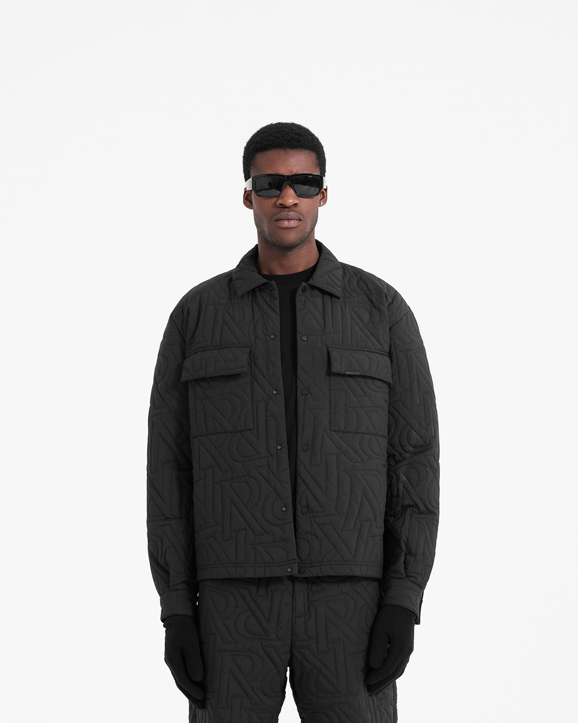 Back product image of a mens black quilted overshirt on a plain white background | Initial Quilted Overshirt in Black | Quilted overshirt with eco down fill and flap pockets | PRE SS23 Shirts | Represent Clo