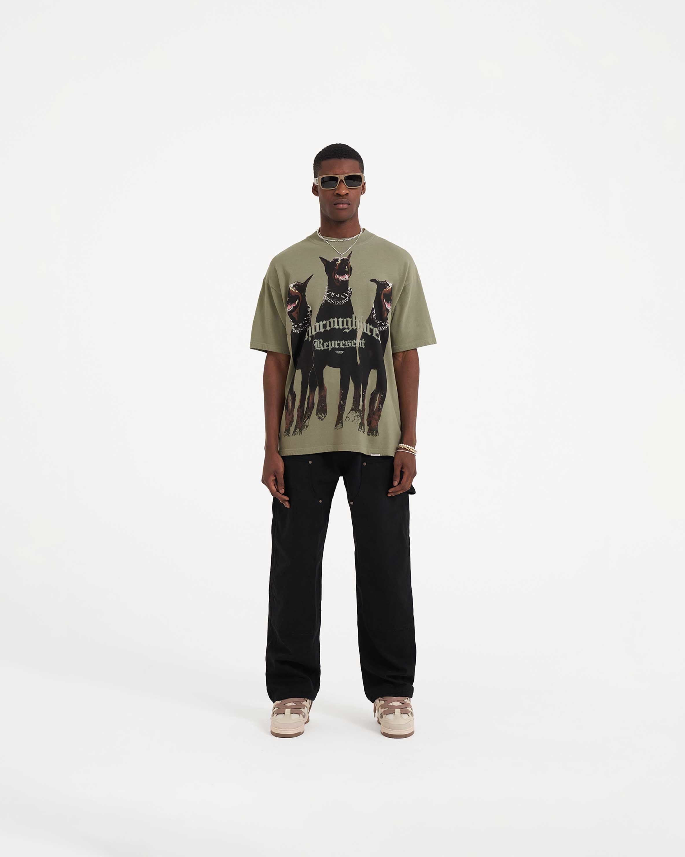 Man wearing a khaki t-shirt on a plain white background | Thoroughbred T-Shirt in Khaki | Slightly oversized short sleeve t-shirt | SS23 T-Shirts | Represent Clo