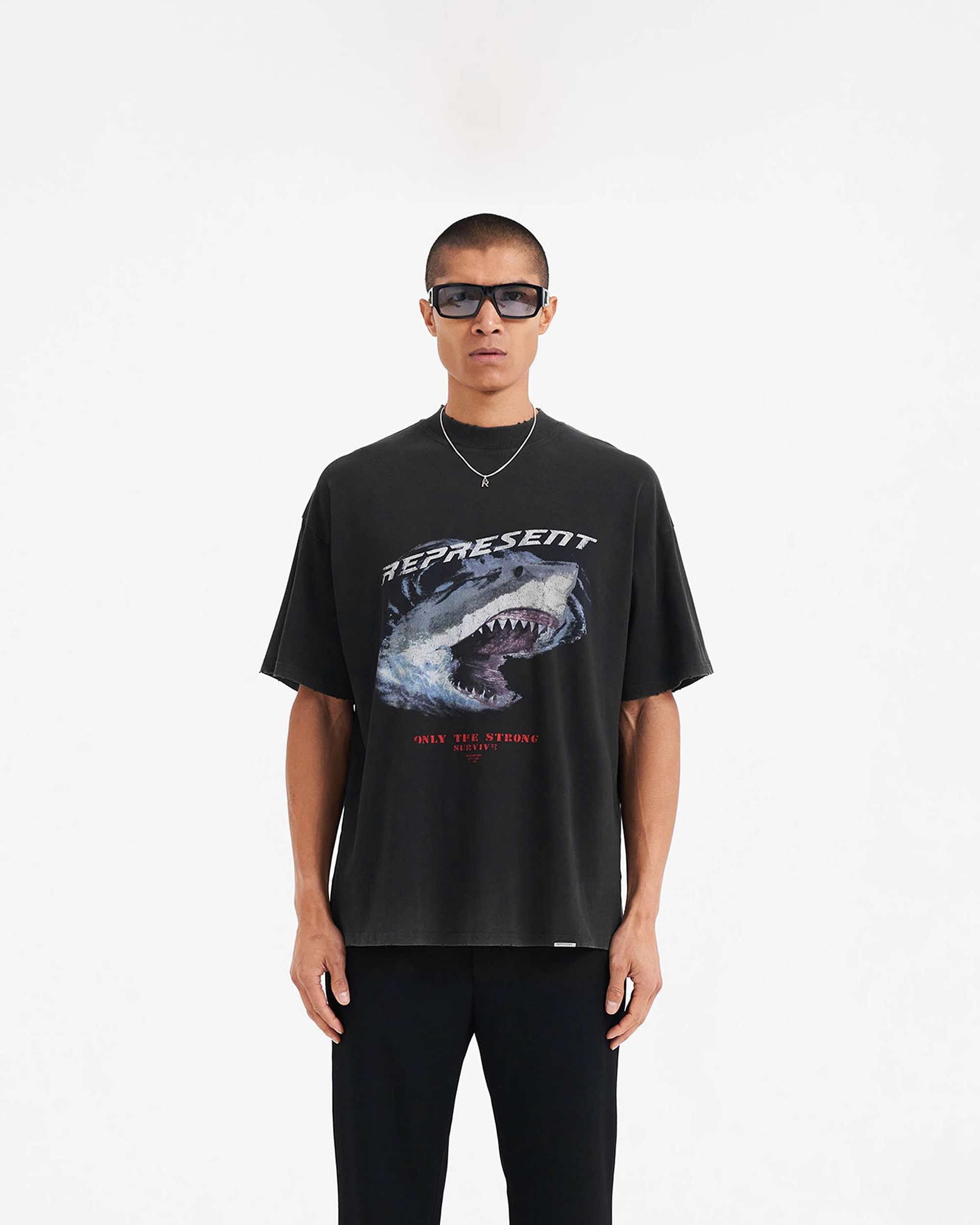 Back product image of a mens black t-shirt on a plain white background | Only The Strong Survive T-shirt in Vintage Black | Slightly oversized fit cotton t-shirt | SS21 T-Shirts | Represent Clo